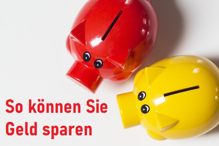 Zwei Sparschweine Rot und Gelb mit Symbol zum Sparen.